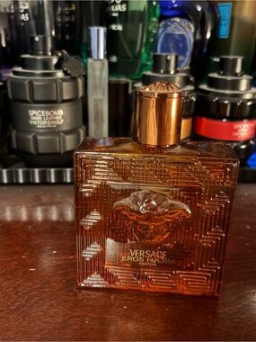 Versace Eros Flame Parfum Bottle in Amber and Gold full